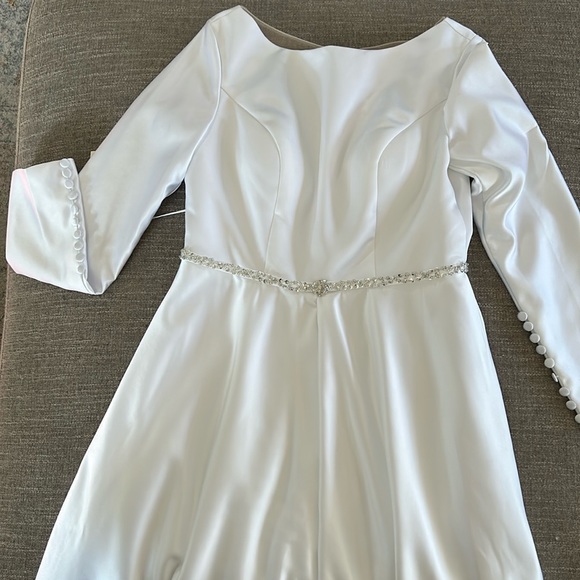 Wedding dress with tags. Rhinestone embellished at waist,real button closure. - Picture 6 of 7